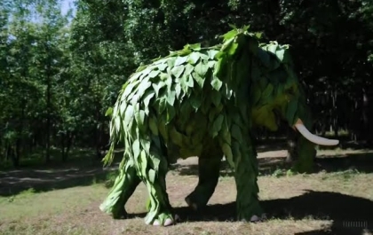 Sora Video: an elephant made of leaves running in the jungle