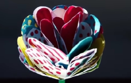 Sora Creative video, stop motion of a colorful paper flower blooming